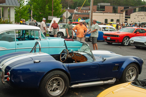 Classic cars and crowd scenes from the 7th Annual A&W Nisswa Cruisin' Night on July 5, 2025, in Nisswa, MN.