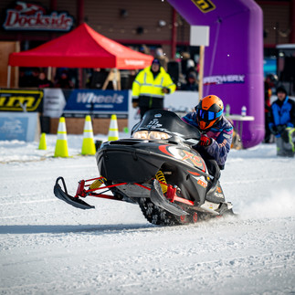 Snowmobile racing action at MESC TripleFest 2026 at Breezy Point Resort in the Brainerd Lakes Area.
