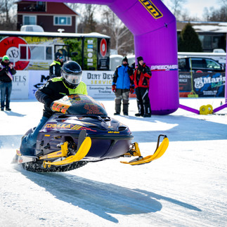 Snowmobile racing action at MESC TripleFest 2026 at Breezy Point Resort in the Brainerd Lakes Area.