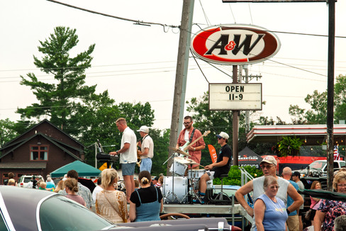 Classic cars and crowd scenes from the 7th Annual A&W Nisswa Cruisin' Night on July 5, 2025, in Nisswa, MN.