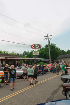 Classic cars and crowd scenes from the 7th Annual A&W Nisswa Cruisin' Night on July 5, 2025, in Nisswa, MN.