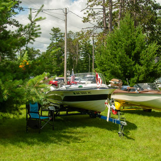 Vintage Larson and Crestliner boats on display at the 2025 Classic Larson Boat Show in Nisswa, Minnesota