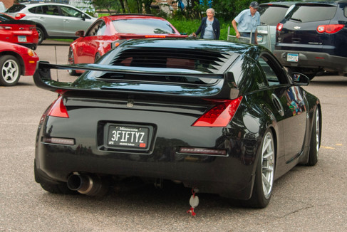 Classic cars and crowd scenes from the 7th Annual A&W Nisswa Cruisin' Night on July 5, 2025, in Nisswa, MN.