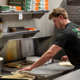 Bror describes Carter Holtzleicer as the woodfire master at Rafferty’s Crosby — someone who has been with the location since day one and has truly mastered the craft.