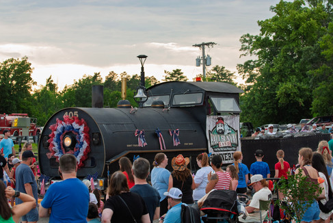 Scenes from the 2025 Nisswa Freedom Days Parade featuring floats, classic cars, local businesses, and community celebration.