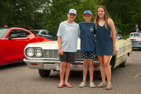 Classic cars and crowd scenes from the 7th Annual A&W Nisswa Cruisin' Night on July 5, 2025, in Nisswa, MN.