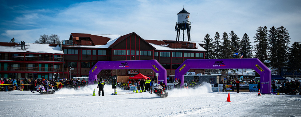 Snowmobile racing action at MESC TripleFest 2026 at Breezy Point Resort in the Brainerd Lakes Area.