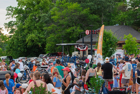 Scenes from the 2025 Nisswa Freedom Days Parade featuring floats, classic cars, local businesses, and community celebration.
