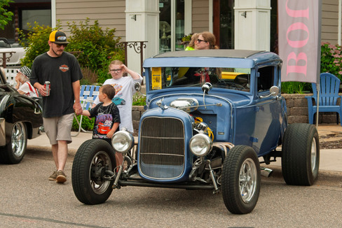 Classic cars and crowd scenes from the 7th Annual A&W Nisswa Cruisin' Night on July 5, 2025, in Nisswa, MN.