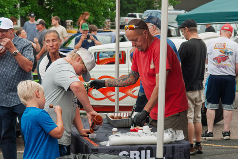 Classic cars and crowd scenes from the 7th Annual A&W Nisswa Cruisin' Night on July 5, 2025, in Nisswa, MN.