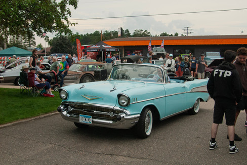 Classic cars and crowd scenes from the 7th Annual A&W Nisswa Cruisin' Night on July 5, 2025, in Nisswa, MN.