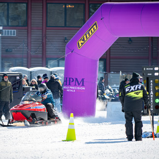 Snowmobile racing action at MESC TripleFest 2026 at Breezy Point Resort in the Brainerd Lakes Area.