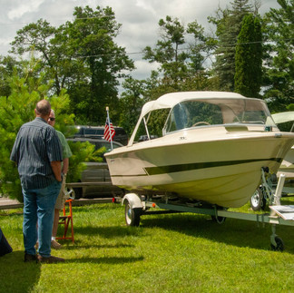 Vintage Larson and Crestliner boats on display at the 2025 Classic Larson Boat Show in Nisswa, Minnesota