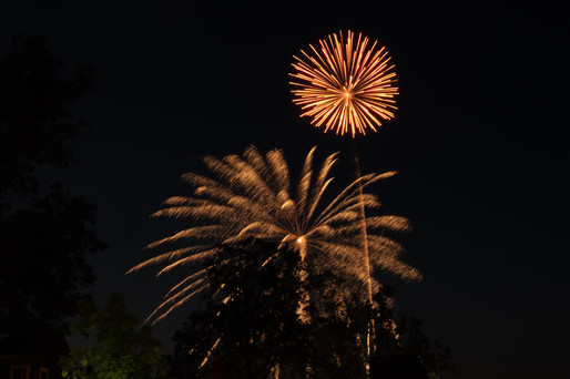 Photos from the 2025 Nisswa Freedom Days 4th of July Fireworks Show, including behind-the-scenes setup with North Star Fireworks and shots of the evening fireworks display.