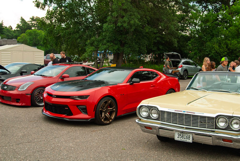 Classic cars and crowd scenes from the 7th Annual A&W Nisswa Cruisin' Night on July 5, 2025, in Nisswa, MN.
