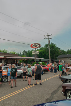 Classic cars and crowd scenes from the 7th Annual A&W Nisswa Cruisin' Night on July 5, 2025, in Nisswa, MN.