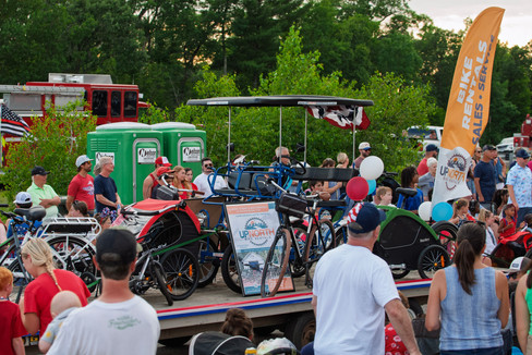 Scenes from the 2025 Nisswa Freedom Days Parade featuring floats, classic cars, local businesses, and community celebration.