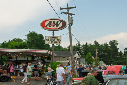 Classic cars and crowd scenes from the 7th Annual A&W Nisswa Cruisin' Night on July 5, 2025, in Nisswa, MN.