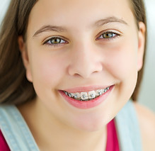 Portrait of cute kid with dental braces