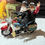 Thumbnail: Possible Dreams NICK AND HIS CHICK- Clothtique-Santa/Mrs. Claus Motorcycle-Box