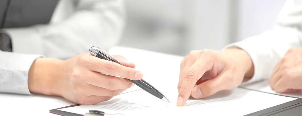 Pointing Pen And Finger On Document_edited.jpg