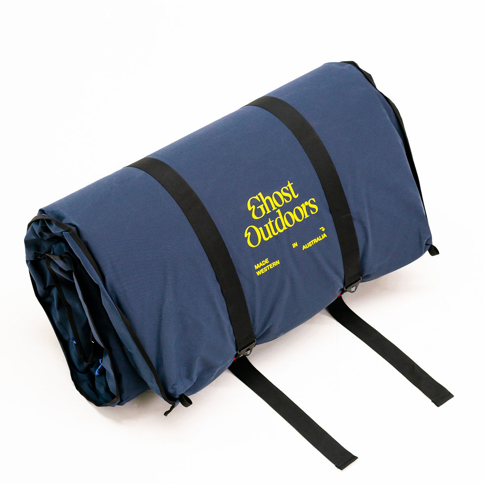 Eye-level view of a laptop screen displaying an online photography portfolio