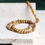 Thumbnail: Fossil coral R bracelet 珊瑚玉圓珠手珠