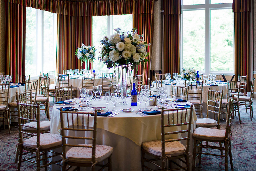 White & blue tall centerpieces at Lake of Isles