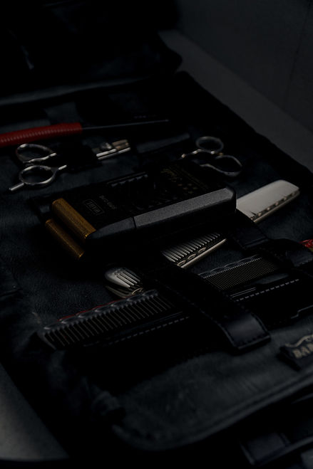 Barber utensils with shaver scissor and comb_edited.jpg