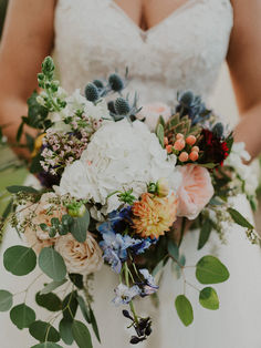 This bridal bouquet exudes wildness, warmth and allure with its earth tones and cascading eucalyptus.