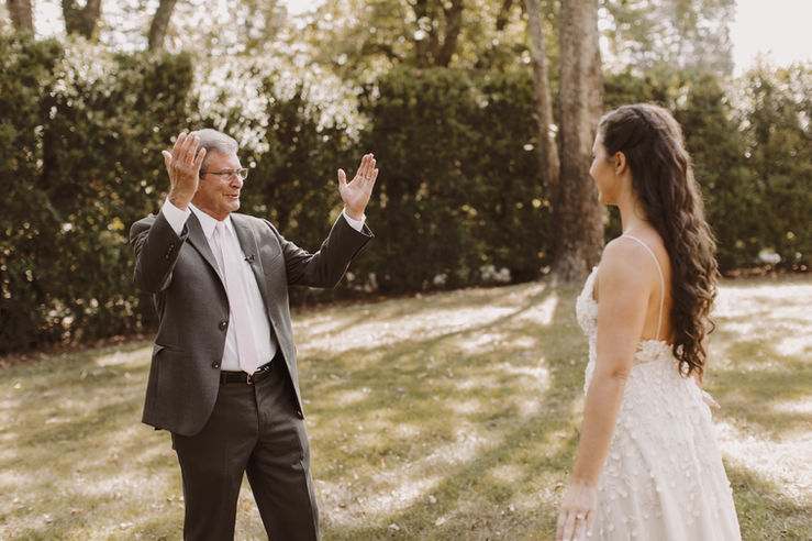 A father expresses his pride and joy to his stunning daughter on her wedding day at Boxwood Villa.