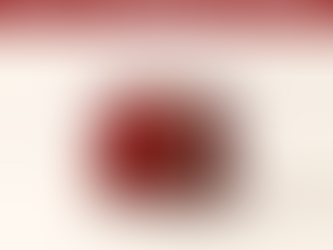 A single, minimal three-dimensional product object — a simple consumer product silhouette such as a chair or a small appliance — rendered half in solid deep red (#880606) and half in a subtly different material texture suggesting recycled versus virgin material, resting on a warm off-white background (RGB 250, 244, 236). Soft, directional studio lighting from the upper left casts a clean, short shadow. A thin electric-blue (#4a4ae2) line traces a circular arc behind the object, suggesting a life cycle without forming any readable symbol. Calm, precise, authoritative mood — the visual language of considered engineering, not eco-marketing.