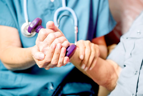 Healthcare professional assisting patien
