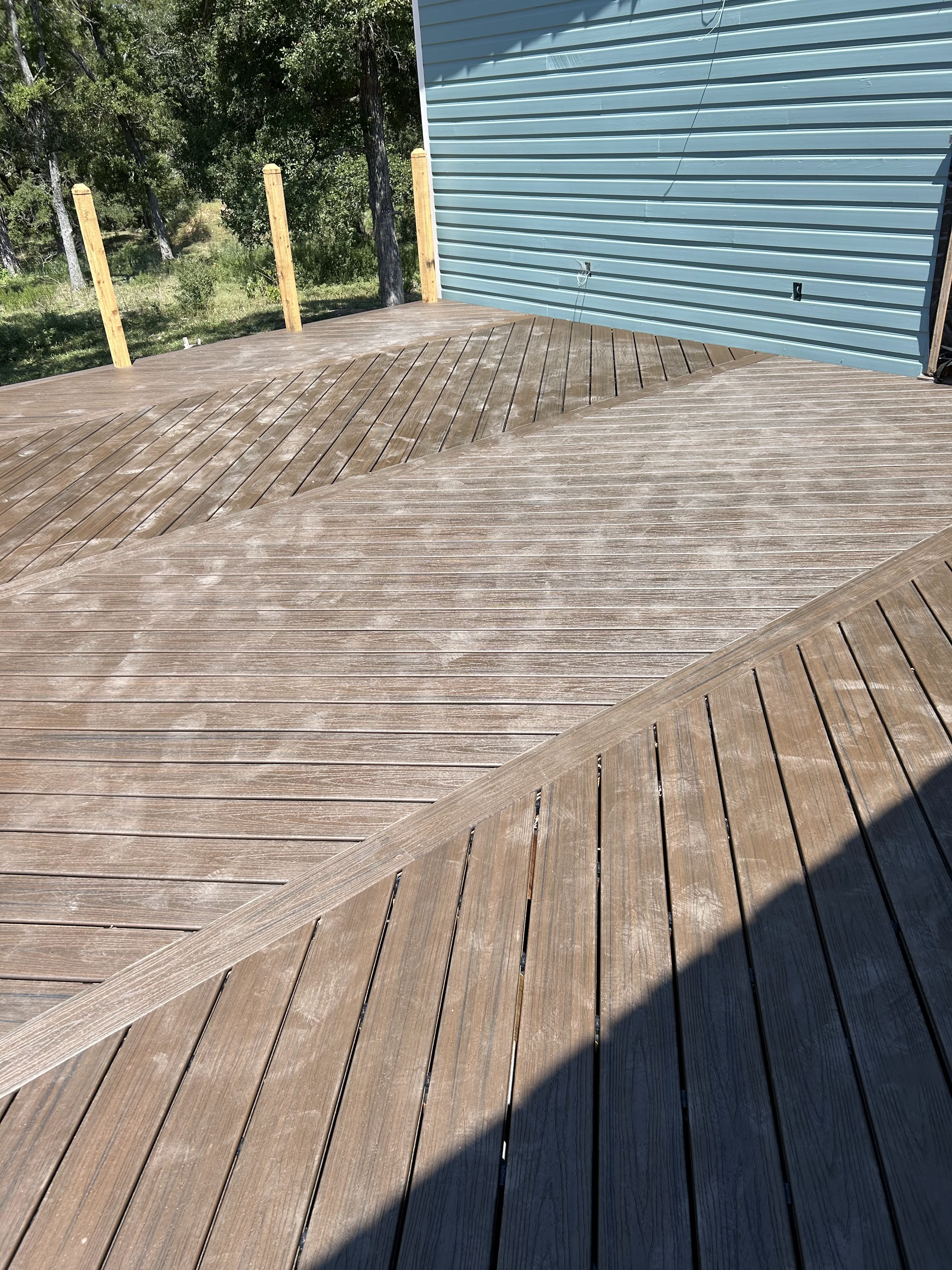 Custom exterior construction remodel of a multi-directional deck