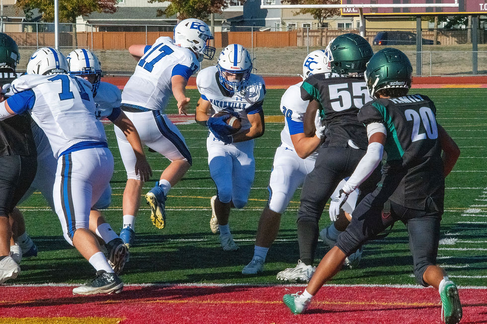 Eatonville running back Connor McIlraith powers through the Foss defense on his way to the end zone for one of his two touchdowns during the Cruisers’ 55-24 victory Friday at Mt. Tahoma Athletic Stadium. Photo: Heather Quirie