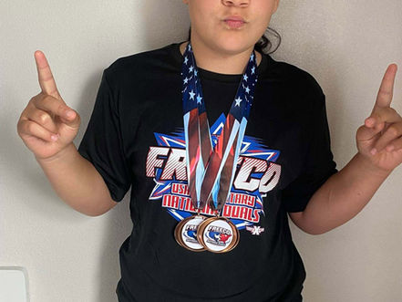 'Stronger than we look' - Eatonville wrestler shines on national stage at Elementary National Duals