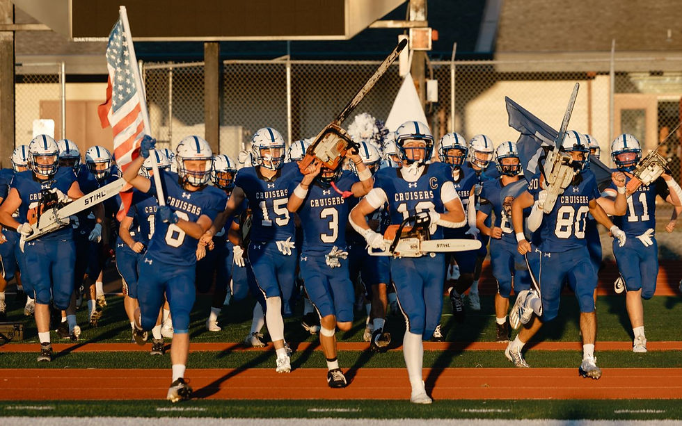 The Eatonville Cruiser football team storms onto the field at Yelm High School prior to their game against the Clover Park Timberwolves. The Cruisers would go on to defeat Clover Park 35-14 to notch their first 2A SPSL League win of the season and improve to 2-1. Photo: Rylea Foehl