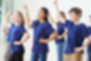 Group Of Children Enjoying Drama Class Together.jpg
