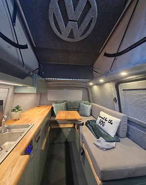 a T5 camper conversion with L shaped furniture