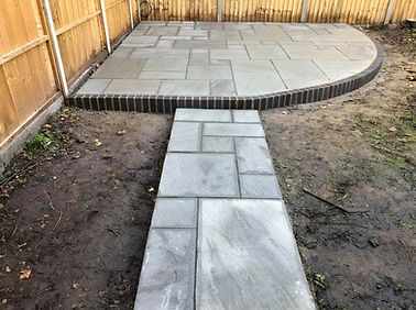 Heres a raised grey indian sandstone patio we completed in hampton hill.jpg