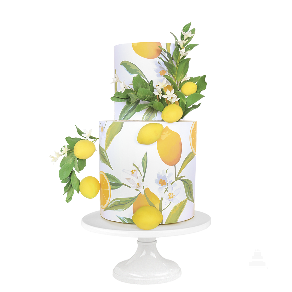 Pastel Día de las Madres de dos niveles con acabado limpio, intervenido con ilustraciones botánicas y decorado con limones