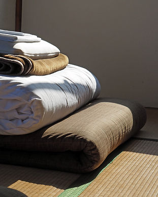 Folded Bedding on Tatami Mat