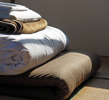 Folded Bedding on Tatami Mat