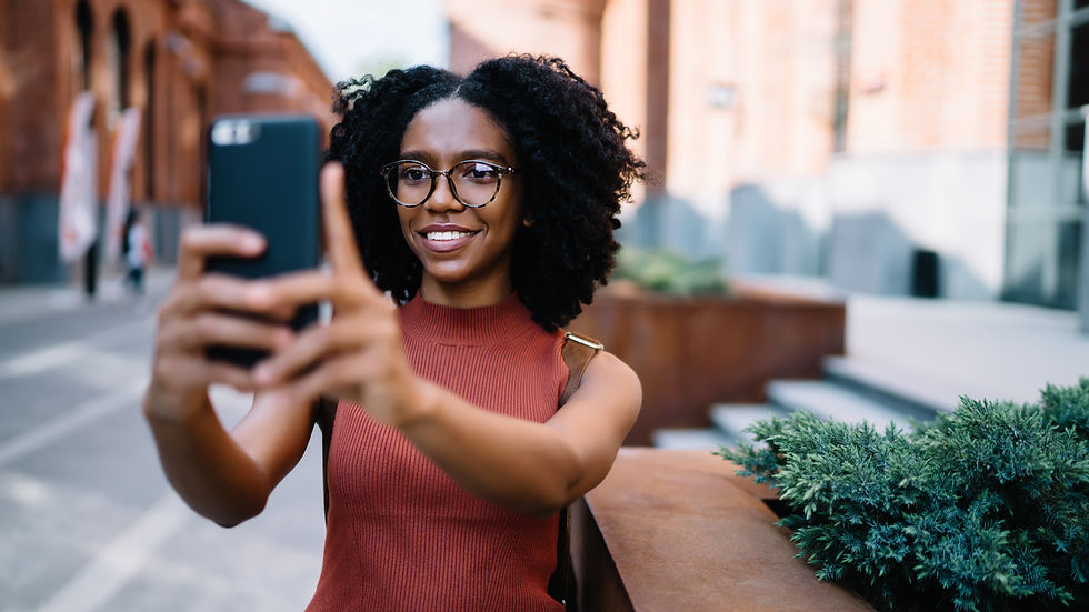 woman taking photo on phone