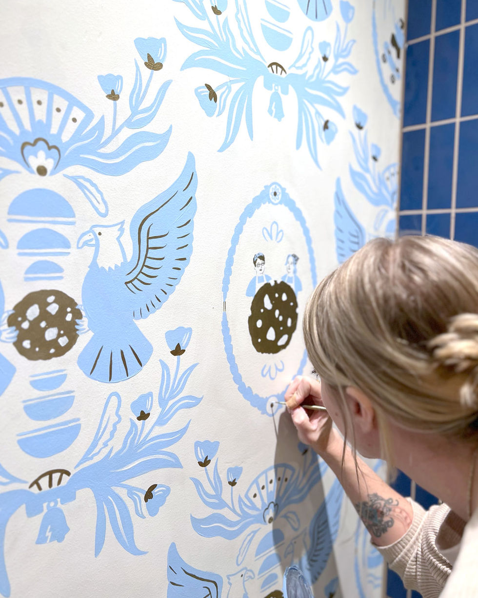 Painting the owners of Levain into the mural