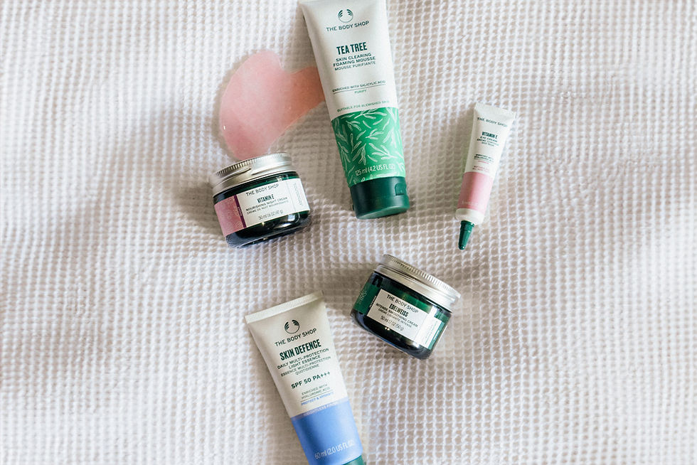 The Body Shop products laid out on a bed sheet, these are the products that Kayleigh uses in her morning skincare routine