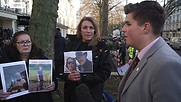Evan Dale interviewing protesters.