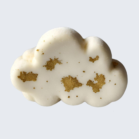 A creamy white bubble bar shaped like a fluffy cloud, infused with coconut for a luxurious, moisturizing bath.