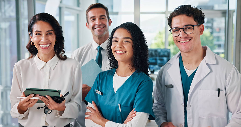 Group of healthcare professionals and business leaders standing together to represent collaboration, advocacy, and access to community healthcare services.