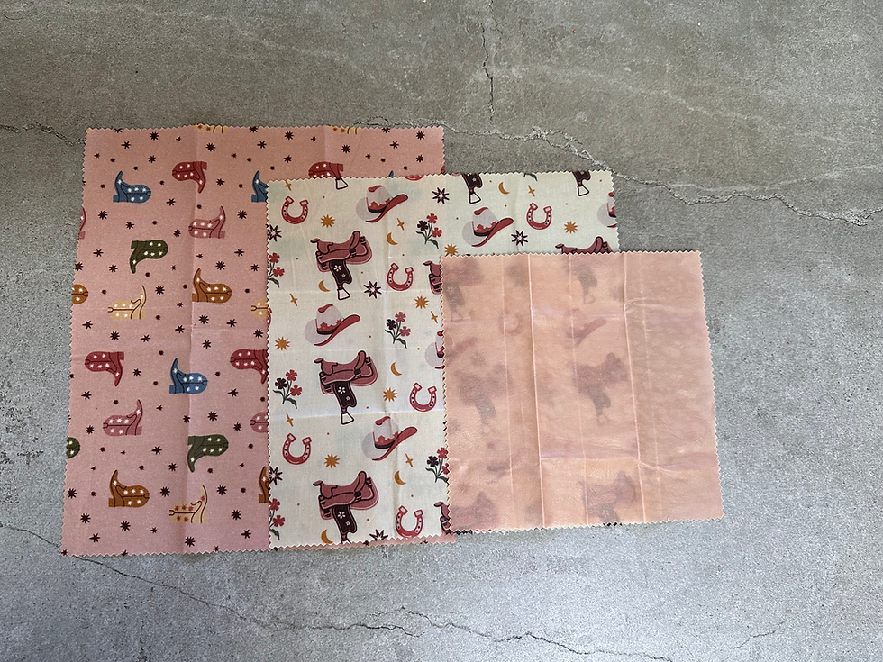 Set of reusable beeswax wraps with a western-inspired cowgirl pattern
